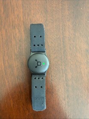 Black Wearable Charger Wristband with Integrated Pod